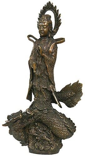 Small Kuan-Yin standing on a dragon