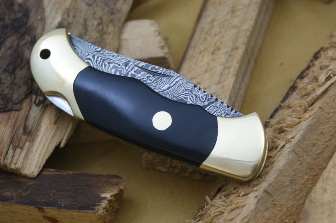 Premium Damascus Lockback Folding Knife. Micarta Handle.Razor Sharp. Solid Quality Hunter.Comes with a Sheath.
