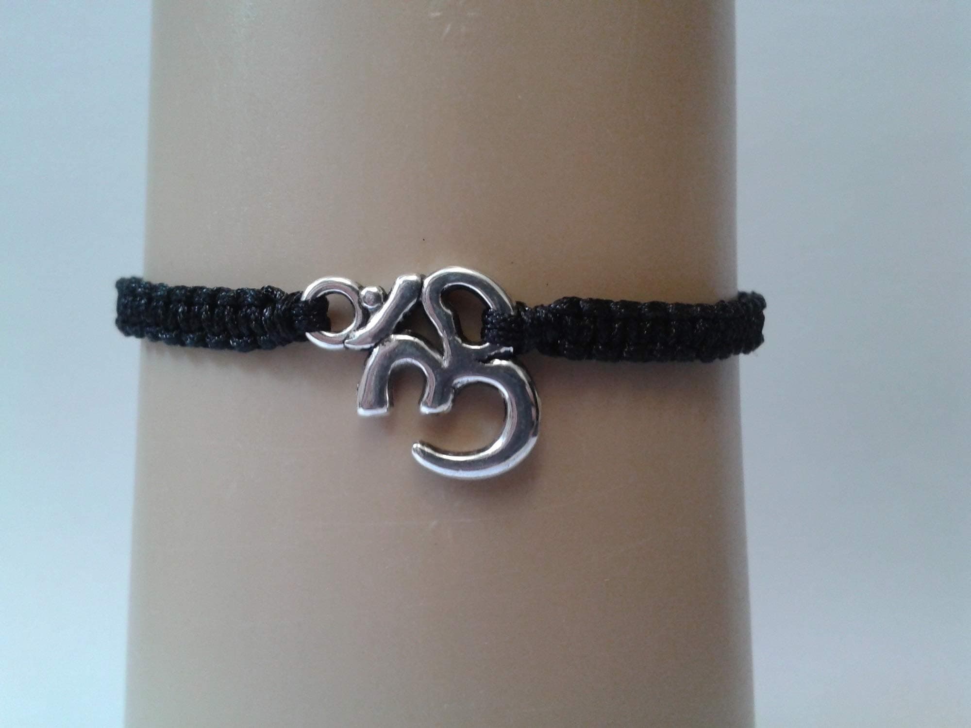 Om bracelet with black cord